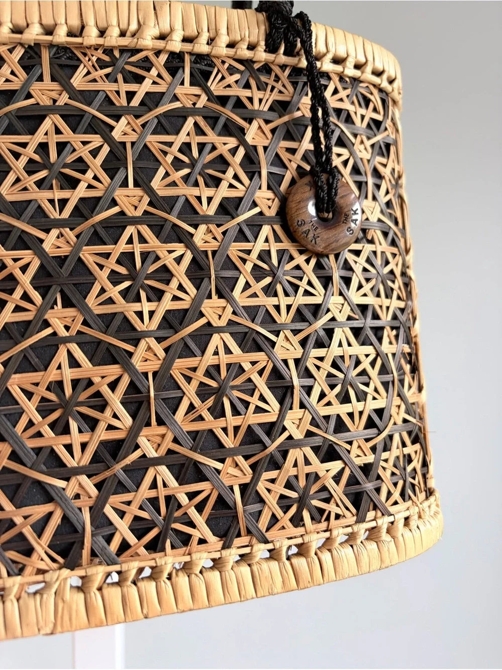 The Sak Woven Rattan Basket Drawstring Tote Purse